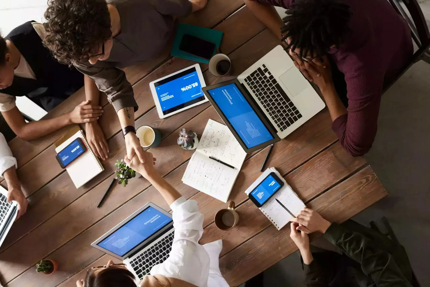 Syncology team collaborating to integrate smart school management systems