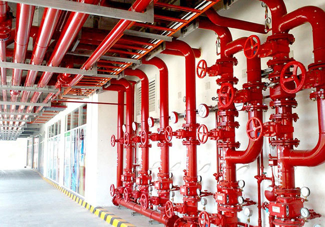 Fire Fighting System 1 Firefighting system for schools – Red fire protection pipelines and valves installed by Syncology