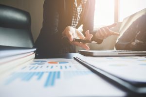 What Is a School Management System? 2 Syncology team planning digital school management solutions.