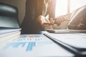 What Is a School Management System? 2 Syncology team planning digital school management solutions.