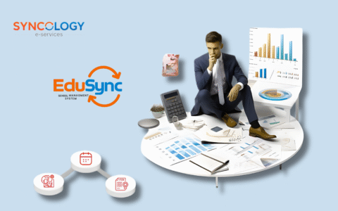 A school administrator analyzing financial reports and digital dashboards using EduSync School Management System for improved School General Accounting.